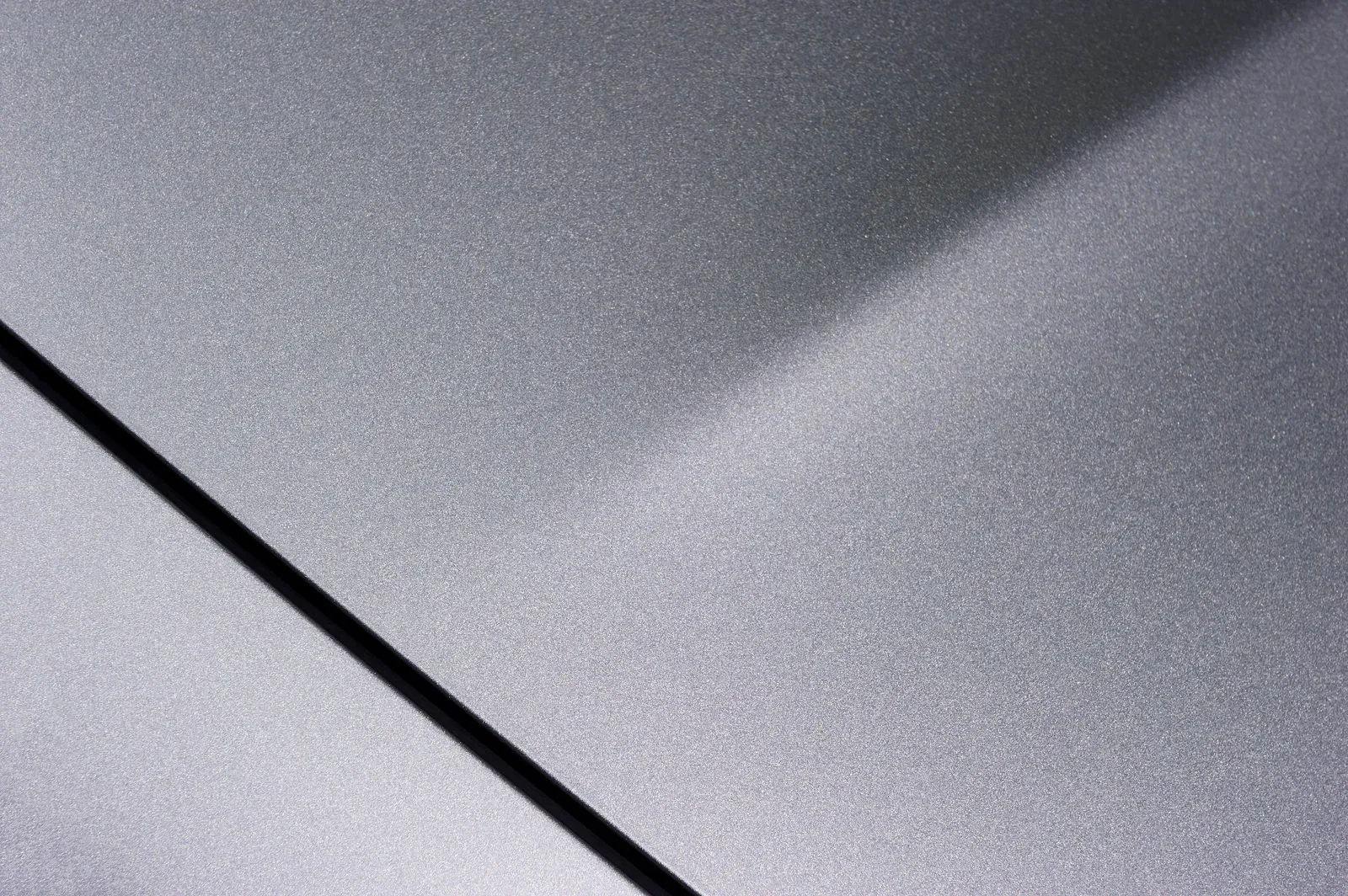 Repaired panel with a factory-match metallic finish